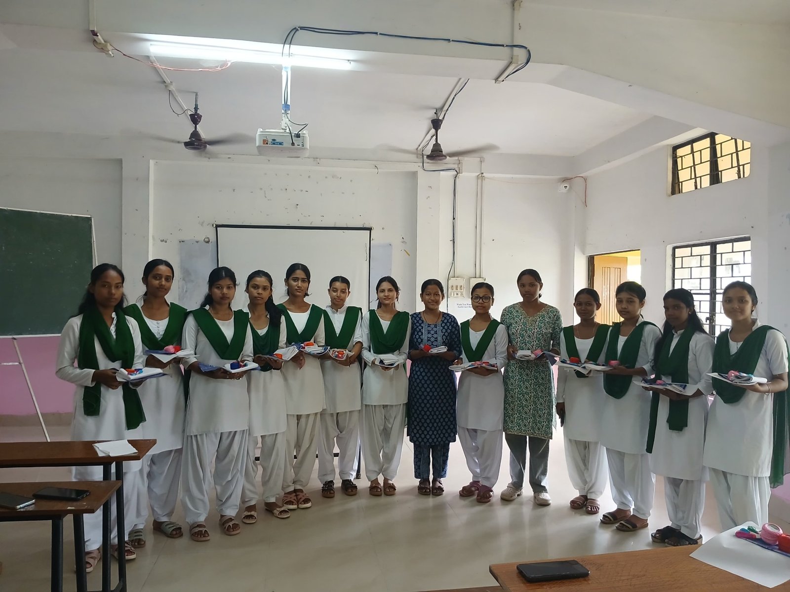 Trainees with embroidery kits